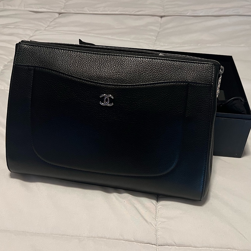 Chanel O-case pouch.